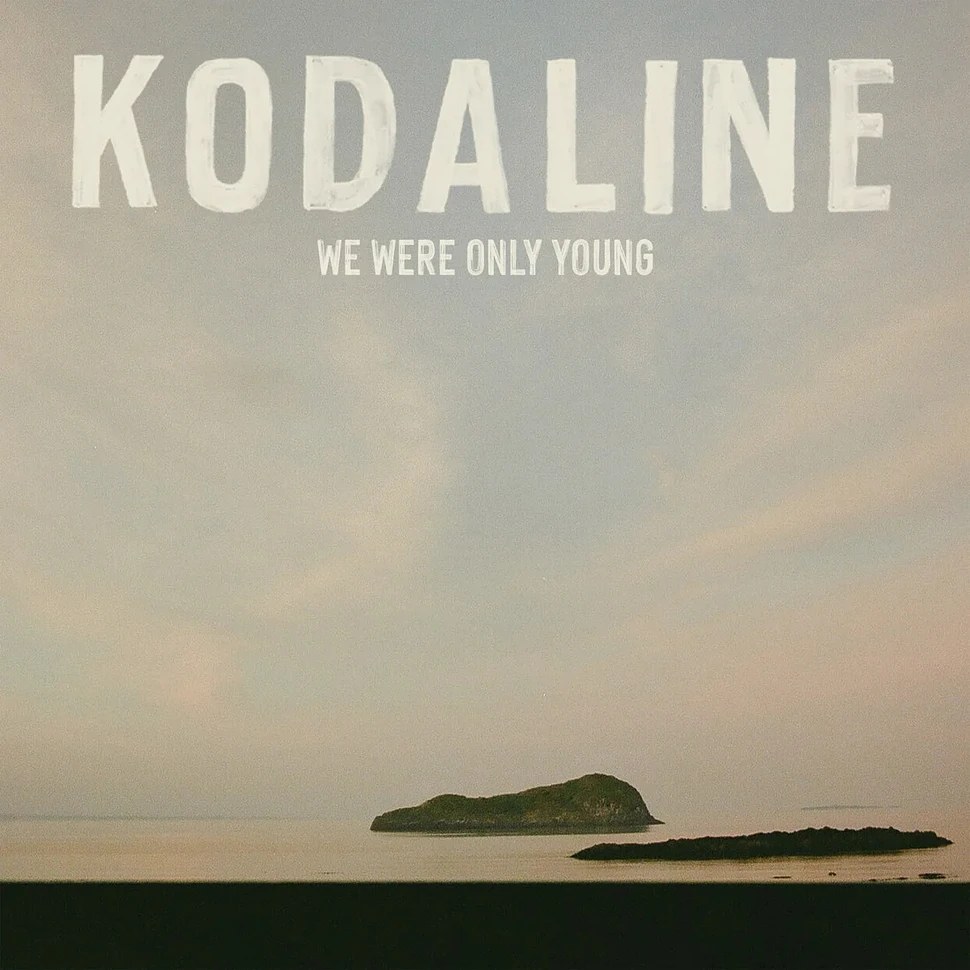 Kodaline, We Were Only Young album cover: a pale evening sky over a calm sea with two small islands